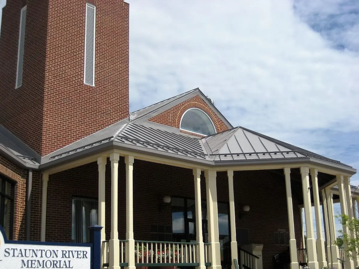 Skilled roofing craftsmen working on a residential roof in Clarkdale